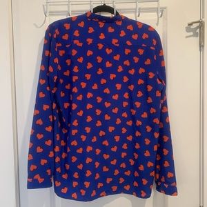 Longsleeve GAP blouse with heart designs.